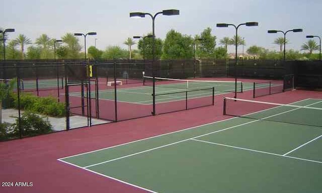 view of sport court featuring basketball hoop