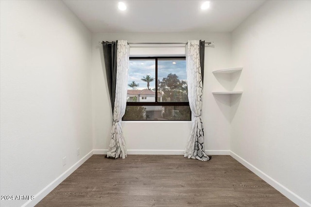 7222 E Gainey Ranch Rd Unit 241, Scottsdale, AZ 85258 - spare room featuring wood finished floors, recessed lighting, and baseboards