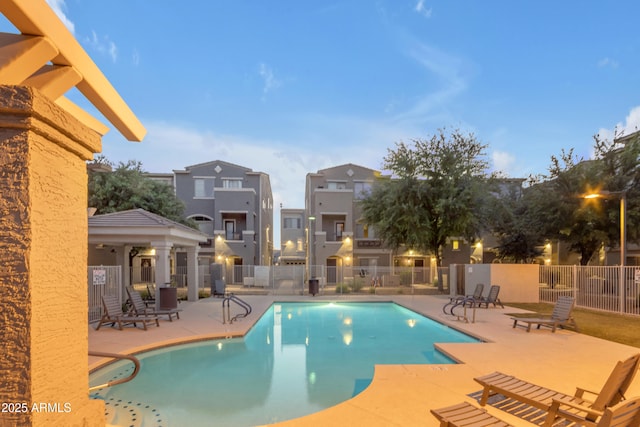 community pool featuring a patio area
