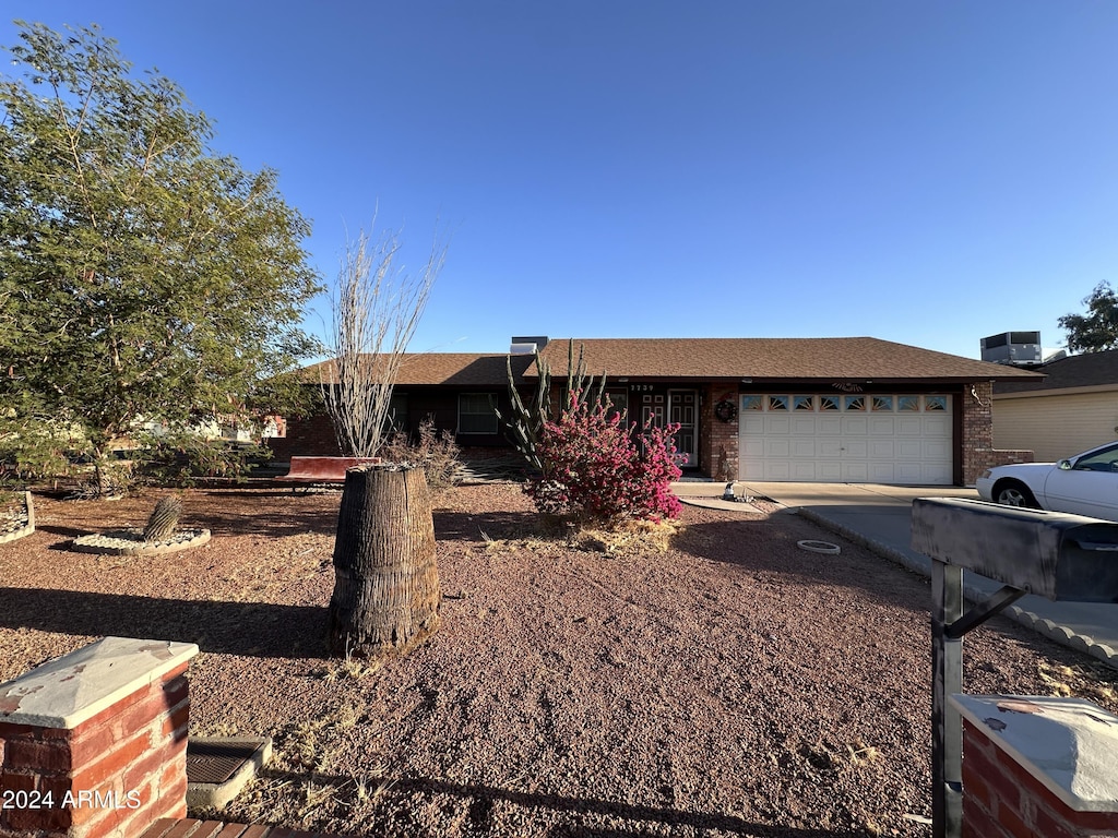 ranch-style house with a garage