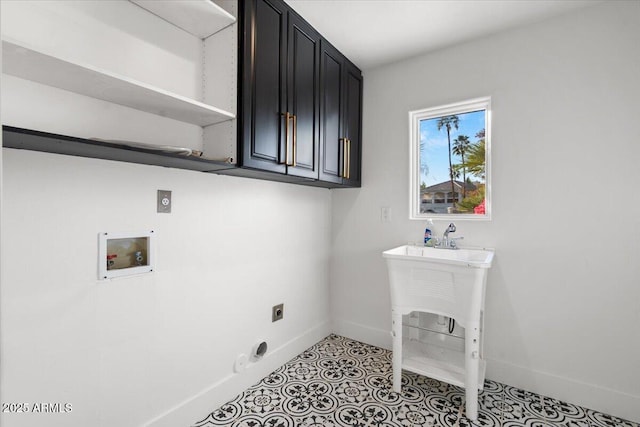 laundry room with cabinet space, baseboards, washer hookup, and hookup for an electric dryer