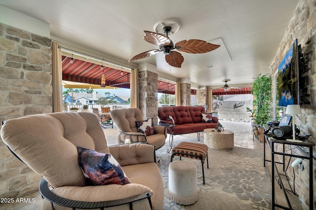 living room featuring ceiling fan