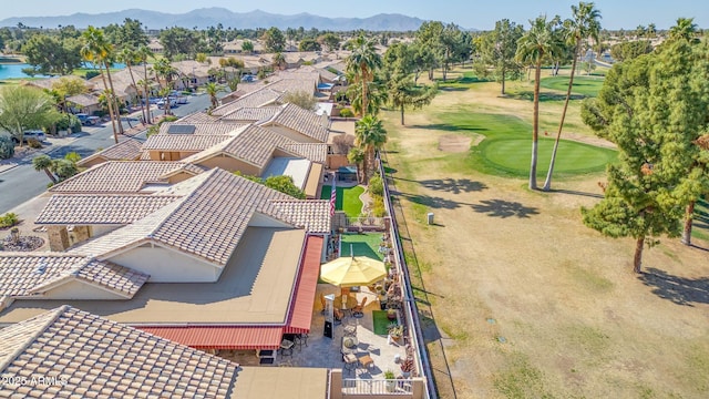 birds eye view of property featuring a mountain view