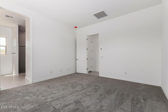 12029 W Marguerite Ave, Avondale, AZ 85323 - carpeted spare room with baseboards