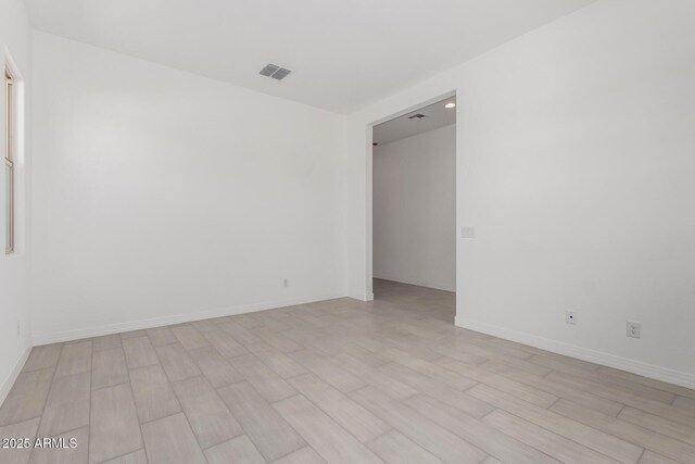 12029 W Marguerite Ave, Avondale, AZ 85323 - unfurnished room with light wood-style flooring and baseboards