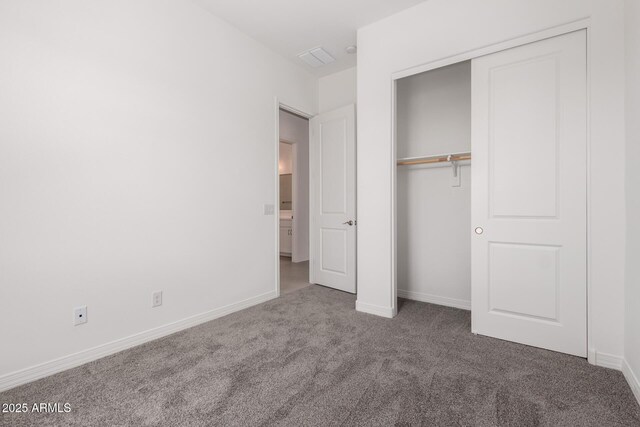 12029 W Marguerite Ave, Avondale, AZ 85323 - unfurnished bedroom with carpet floors, baseboards, and a closet