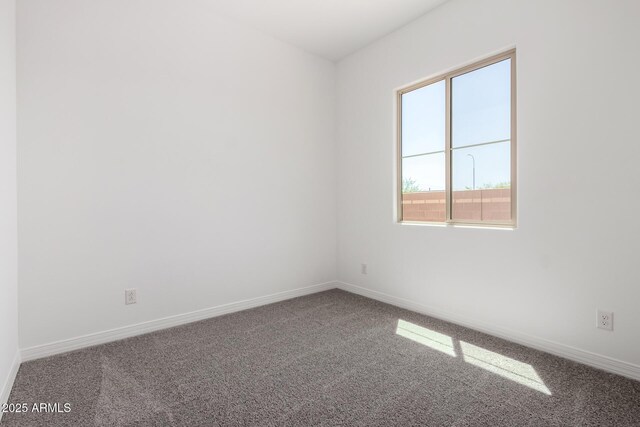 12029 W Marguerite Ave, Avondale, AZ 85323 - carpeted empty room with baseboards