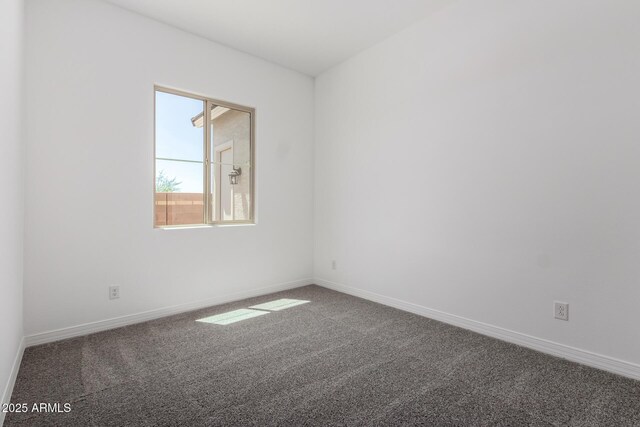 12029 W Marguerite Ave, Avondale, AZ 85323 - spare room with carpet floors and baseboards