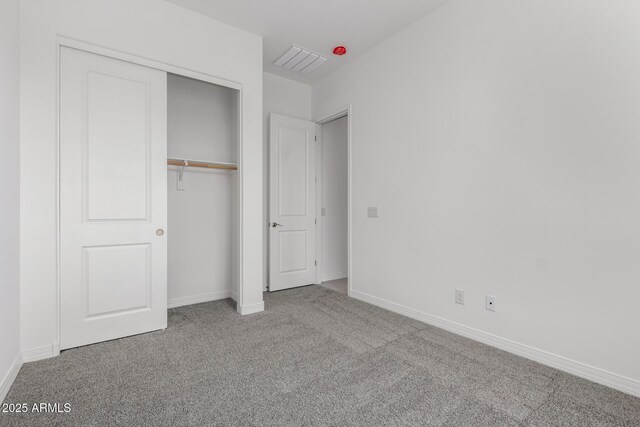 12029 W Marguerite Ave, Avondale, AZ 85323 - unfurnished bedroom with carpet flooring, a closet, and baseboards