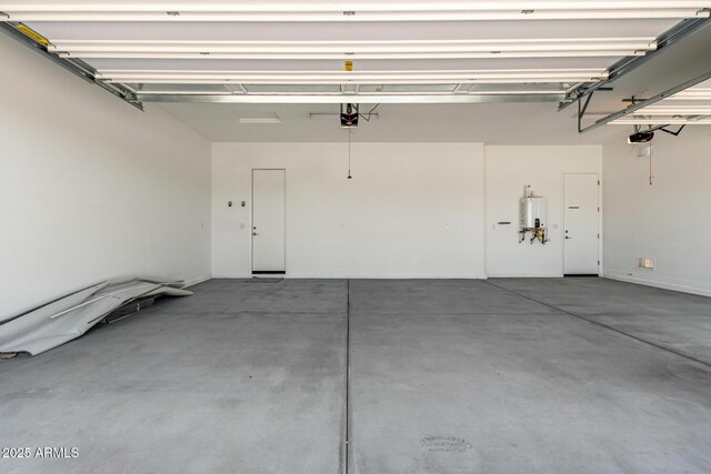12029 W Marguerite Ave, Avondale, AZ 85323 - garage with a garage door opener and water heater