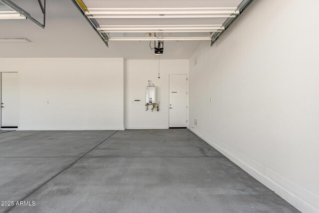 12029 W Marguerite Ave, Avondale, AZ 85323 - garage with a garage door opener and tankless water heater