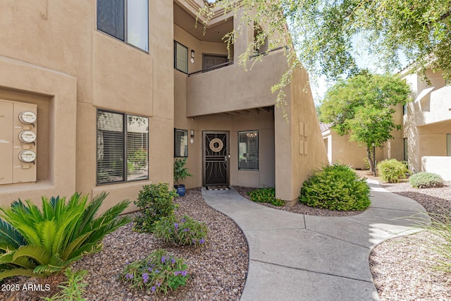 7575 E Indian Bend Rd Unit 1142, Scottsdale, AZ 85250 - doorway to property featuring stucco siding