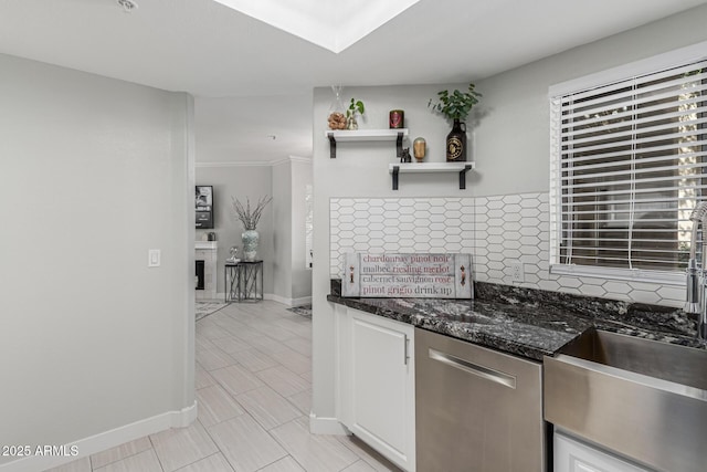 7575 E Indian Bend Rd Unit 1142, Scottsdale, AZ 85250 - kitchen featuring dishwasher, white cabinets, decorative backsplash, baseboards, and light tile patterned floors