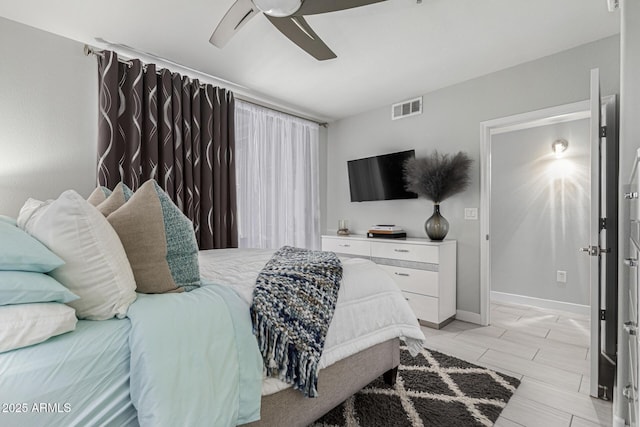 7575 E Indian Bend Rd Unit 1142, Scottsdale, AZ 85250 - bedroom with ceiling fan and baseboards