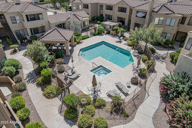 7575 E Indian Bend Rd Unit 1142, Scottsdale, AZ 85250 - community pool featuring a gazebo, a residential view, and a patio