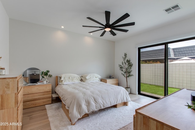 bedroom featuring a ceiling fan, access to exterior, visible vents, recessed lighting, and light wood-style flooring