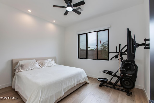 bedroom featuring recessed lighting, baseboards, a ceiling fan, wood finished floors, and visible vents