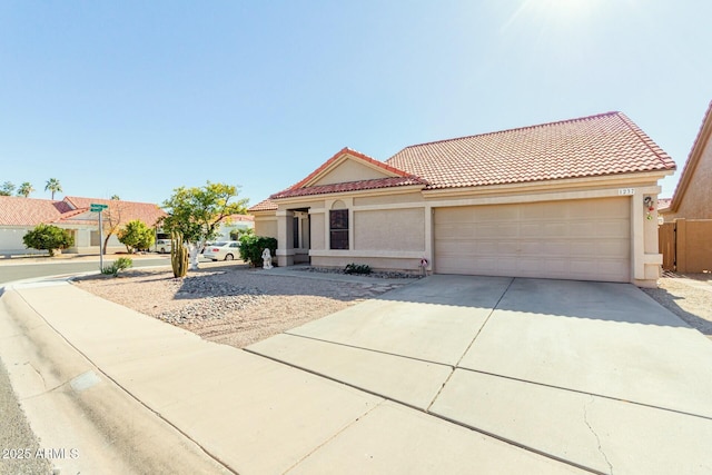 mediterranean / spanish-style house featuring a garage