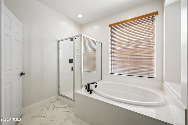full bath featuring a stall shower, baseboards, recessed lighting, a bath, and marble finish floor