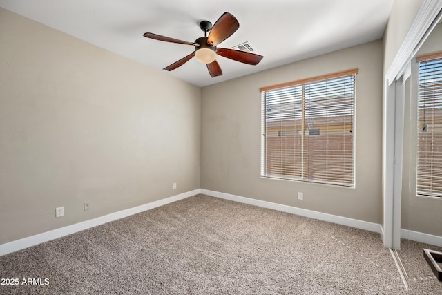 unfurnished bedroom with baseboards, ceiling fan, and carpet flooring