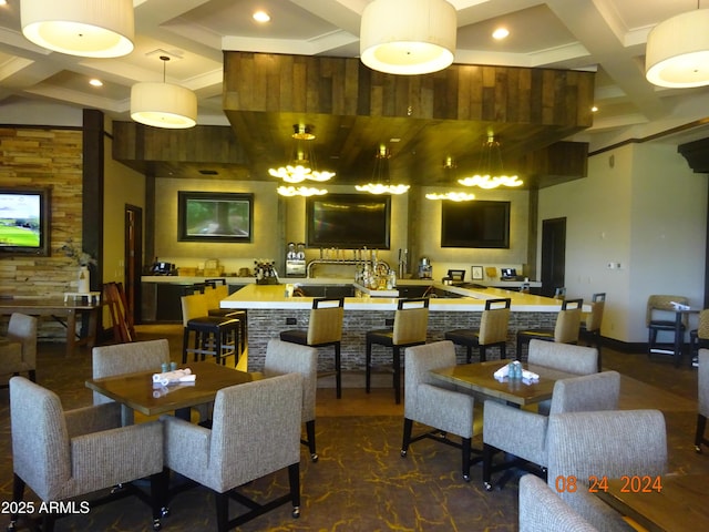 dining space with beamed ceiling, coffered ceiling, and a notable chandelier