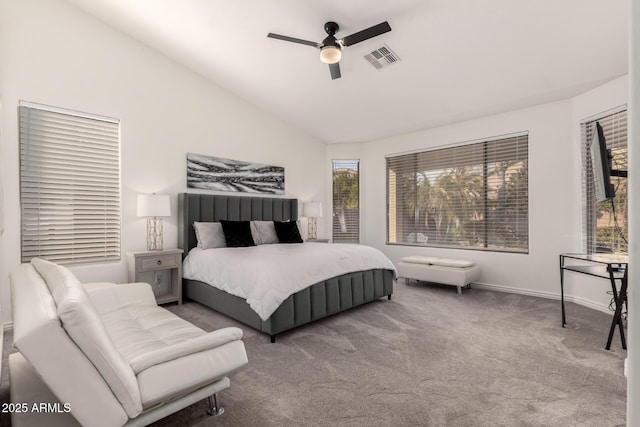 bedroom with ceiling fan, carpet, and lofted ceiling