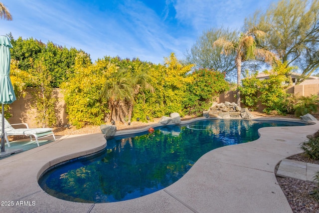 view of pool featuring a patio