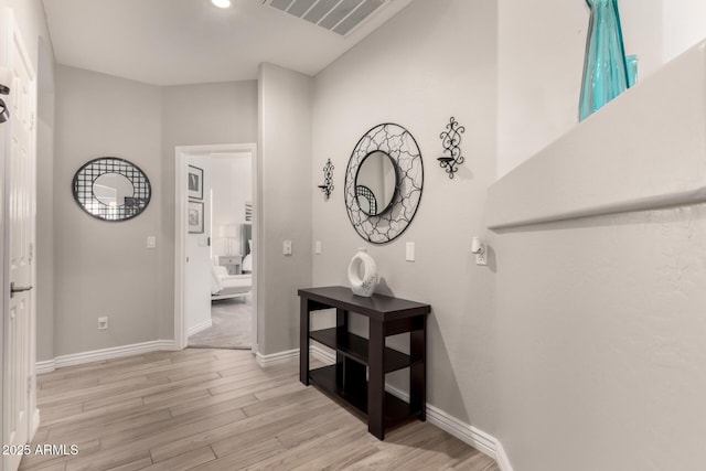 hall featuring light hardwood / wood-style flooring