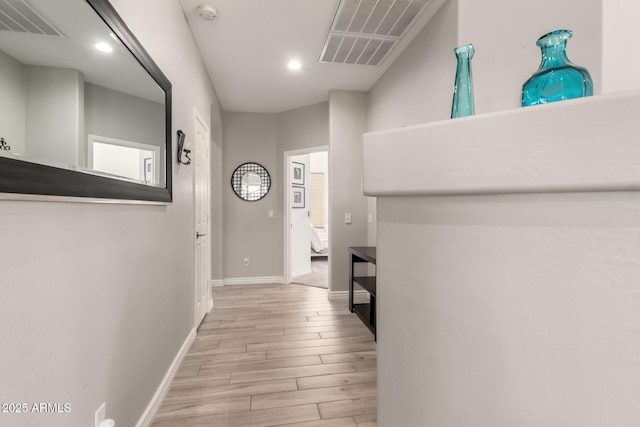 hall featuring light hardwood / wood-style flooring