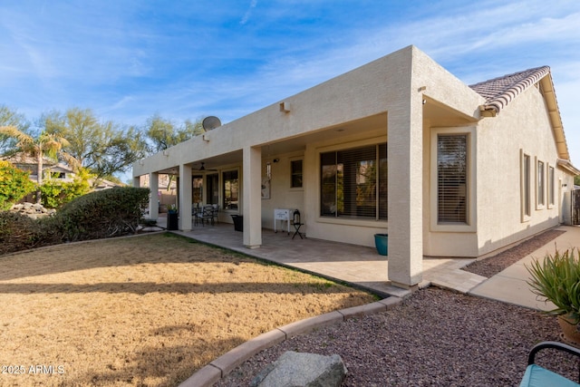 back of property featuring a patio area