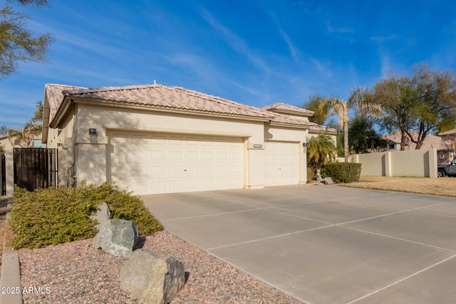 view of side of property featuring a garage