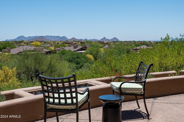 view of patio featuring a mountain view and an outdoor hangout area