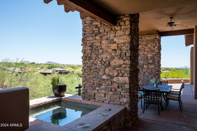 exterior space with a patio and ceiling fan