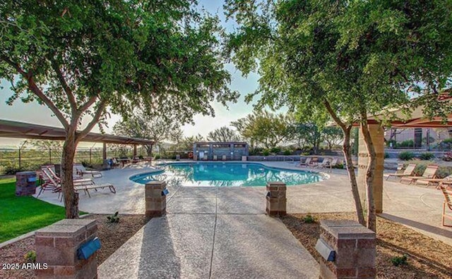 community pool featuring a patio