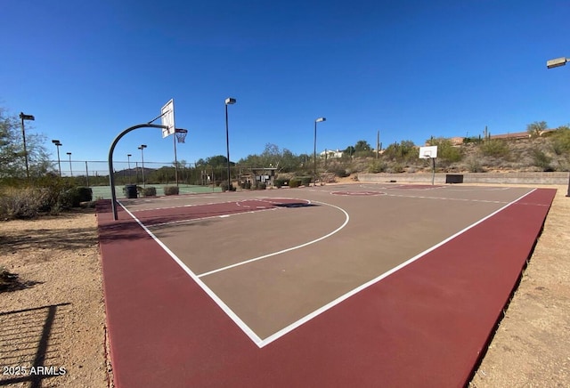 view of sport court with fence and community basketball court