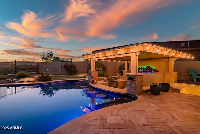 31108 N 122nd Ln, Peoria, AZ 85383 - pool at dusk featuring a fenced backyard, a grill, a patio area, and a gazebo