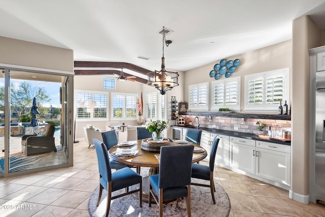 31108 N 122nd Ln, Peoria, AZ 85383 - dining area featuring healthy amount of natural light, ceiling fan, a chandelier, and light tile patterned floors