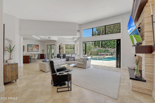 living room featuring a chandelier