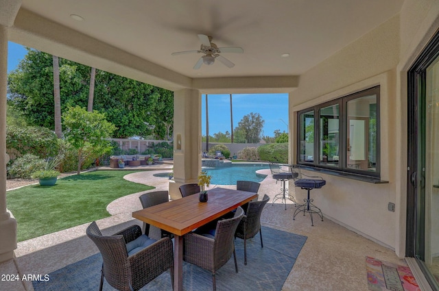 view of patio / terrace with ceiling fan