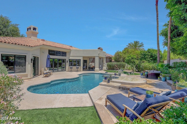 view of pool featuring a patio area