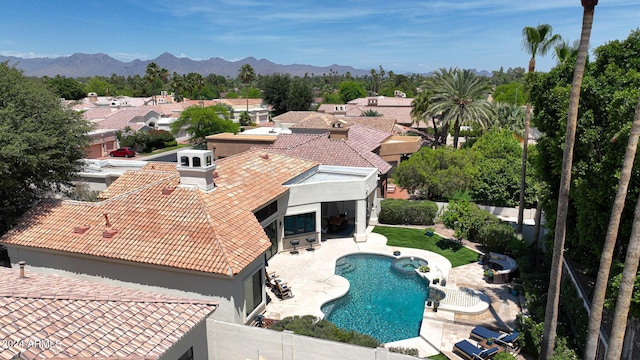 view of pool with a mountain view