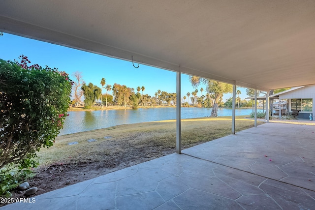 view of patio featuring a water view