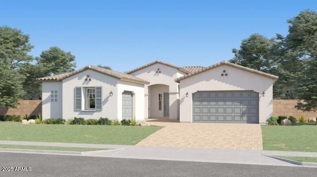 9621 W Monterey Way, Phoenix, AZ 85037 - mediterranean / spanish-style home with an attached garage, stucco siding, driveway, and a tile roof