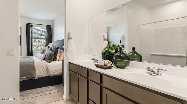 9621 W Monterey Way, Phoenix, AZ 85037 - bathroom featuring double vanity and ensuite bathroom