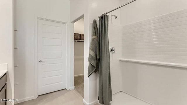 9621 W Monterey Way, Phoenix, AZ 85037 - bathroom with a shower with shower curtain, vanity, and tile patterned floors