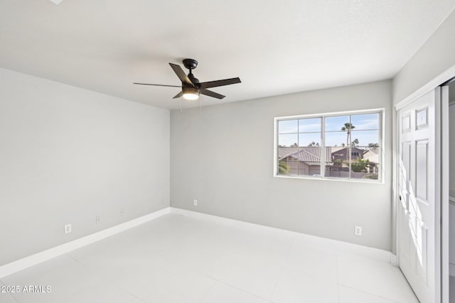 unfurnished bedroom featuring ceiling fan