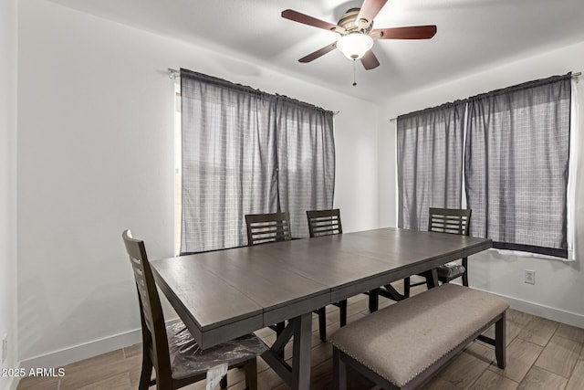 7725 S 47th Ln, Laveen, AZ 85339 - dining room featuring light wood-type flooring and a ceiling fan