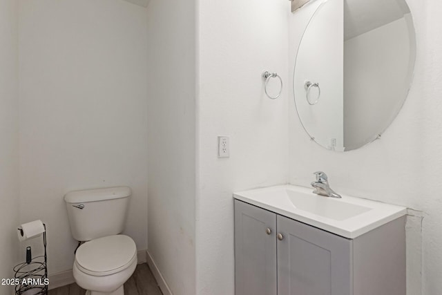 7725 S 47th Ln, Laveen, AZ 85339 - half bath with vanity and wood finished floors