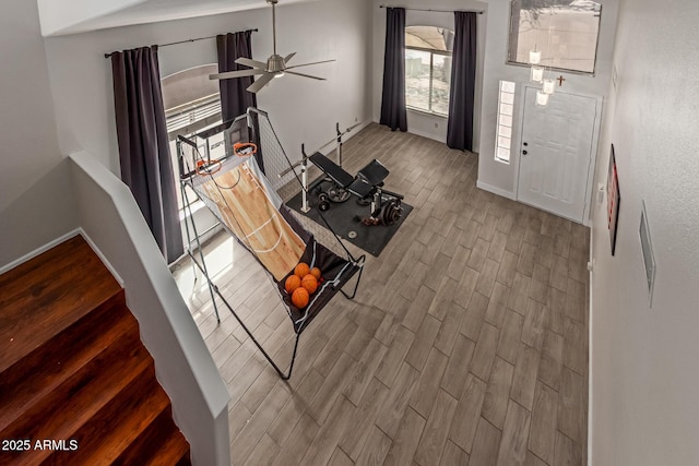 7725 S 47th Ln, Laveen, AZ 85339 - living area with wood finished floors and ceiling fan