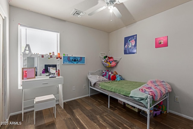 7725 S 47th Ln, Laveen, AZ 85339 - bedroom featuring wood-type flooring and a ceiling fan